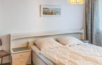 Ein Bett oder Betten in einem Zimmer der Unterkunft 1 Bedroom Stunning Apartment In Büsum