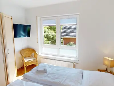 Ein Bett oder Betten in einem Zimmer der Unterkunft Strandburg - 6