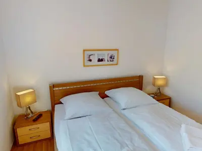 Ein Bett oder Betten in einem Zimmer der Unterkunft Strandburg - 6