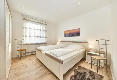 Ein Bett oder Betten in einem Zimmer der Unterkunft Strandhus Cuxi - 1