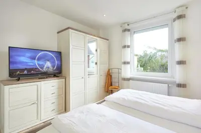 Ein Bett oder Betten in einem Zimmer der Unterkunft Strandhus Cuxi - 1