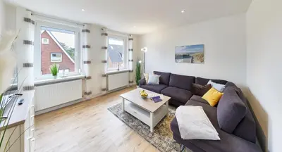 Ein Sitzbereich in der Unterkunft Strandhus Cuxi - 2