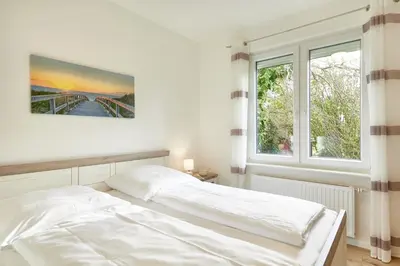 Ein Bett oder Betten in einem Zimmer der Unterkunft Strandhus Cuxi - 3