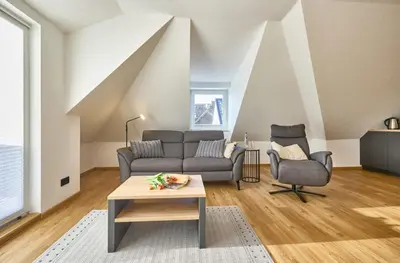 Ein Sitzbereich in der Unterkunft Haus Oasis - 18
