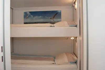 Ein Bett oder Betten in einem Zimmer der Unterkunft Hanseatic 101