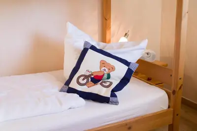 Ein Bett oder Betten in einem Zimmer der Unterkunft Apartmenthaus Frauenpreiss FeWo 205