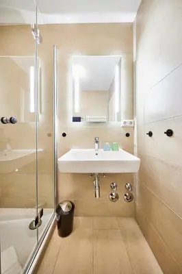 Ein Badezimmer in der Unterkunft Ferienwohnung mit Seesicht Grimmershörnbucht