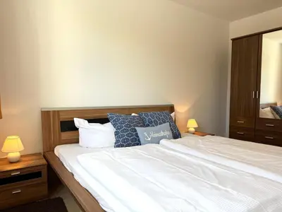 Ein Bett oder Betten in einem Zimmer der Unterkunft Haus am Waldbad Whg 1
