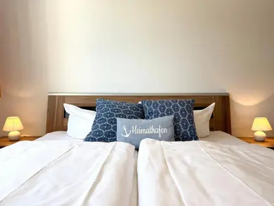 Ein Bett oder Betten in einem Zimmer der Unterkunft Haus am Waldbad Whg 3