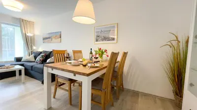 Ein Sitzbereich in der Unterkunft Nordseebrandung B1 1