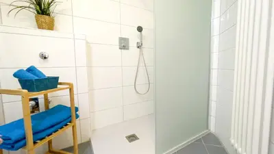 Ein Badezimmer in der Unterkunft Nordseebrandung B1 1