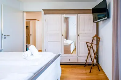Ein Bett oder Betten in einem Zimmer der Unterkunft Strandpalais PA07