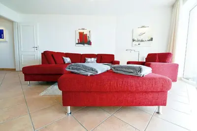Ein Sitzbereich in der Unterkunft Strandpalais PB16