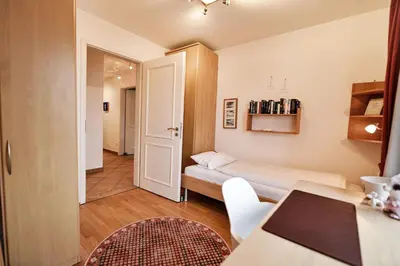 Ein Bett oder Betten in einem Zimmer der Unterkunft Strandpalais PB16