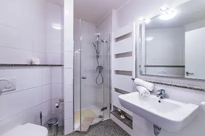 Ein Badezimmer in der Unterkunft Strandpalais PE08