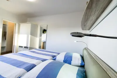 Ein Bett oder Betten in einem Zimmer der Unterkunft Am Sahlenburger Strand AS18