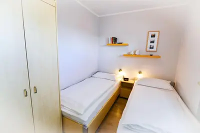 Ein Bett oder Betten in einem Zimmer der Unterkunft Am Sahlenburger Strand AS25