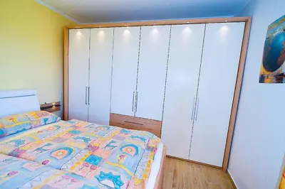 Ein Bett oder Betten in einem Zimmer der Unterkunft Am Sahlenburger Strand AS33