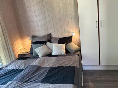 Ein Bett oder Betten in einem Zimmer der Unterkunft Nordseeperle-Ferienhaus