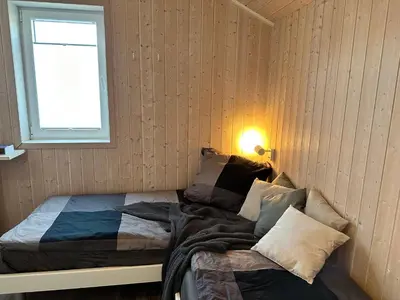 Ein Bett oder Betten in einem Zimmer der Unterkunft Nordseeperle-Ferienhaus
