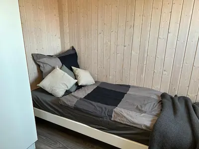 Ein Bett oder Betten in einem Zimmer der Unterkunft Nordseeperle-Ferienhaus