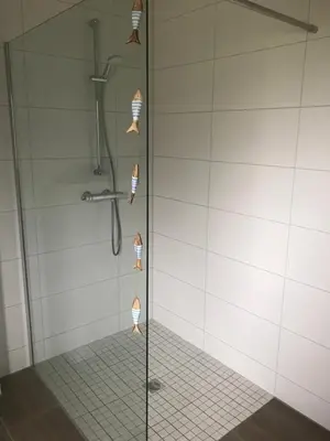 Ein Badezimmer in der Unterkunft Ferienhaus am Heringskoop