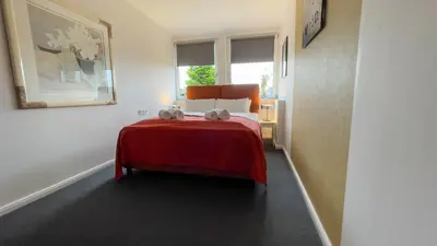 Ein Bett oder Betten in einem Zimmer der Unterkunft Leuchtfeuer 4