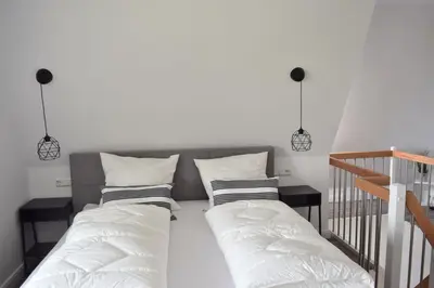 Ein Bett oder Betten in einem Zimmer der Unterkunft Schönes Apartment (Nr. 9) über 2 Etagen