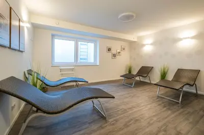 Ein Sitzbereich in der Unterkunft 5 Sterne Penthouse Strandsuite