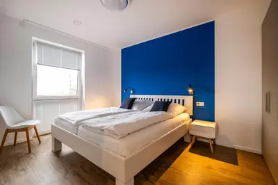Ein Bett oder Betten in einem Zimmer der Unterkunft 5 Sterne Penthouse Strandsuite