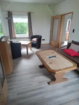 Ein Sitzbereich in der Unterkunft Ferienwohnung Wremen