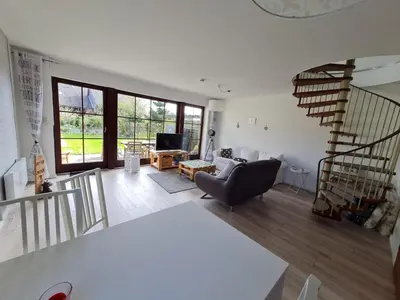 Ein Sitzbereich in der Unterkunft Ferienhaus Kleine Robbe
