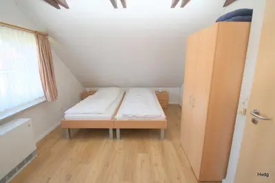 Ein Bett oder Betten in einem Zimmer der Unterkunft Ferienhaus Hochreuther