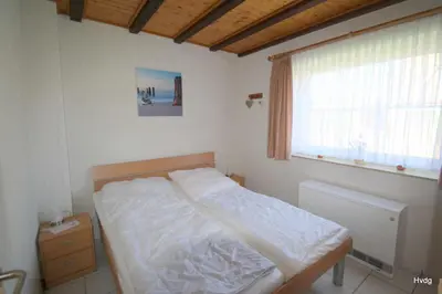 Ein Bett oder Betten in einem Zimmer der Unterkunft Ferienhaus Hochreuther