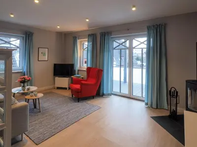 TV/Unterhaltungsangebot in der Unterkunft Strandpalais Apartment Kombüse