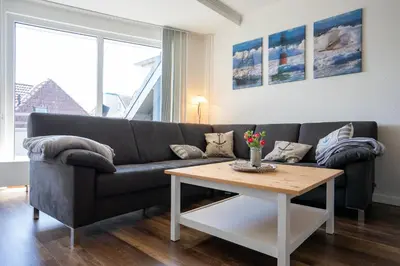 Ein Sitzbereich in der Unterkunft Residenz Rosengarten Wohnung Meerjungfrau 1