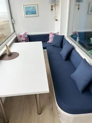 Ein Sitzbereich in der Unterkunft Haus Seehund FeWo 16