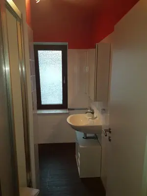 Ein Badezimmer in der Unterkunft Kleine Nixe Hummer