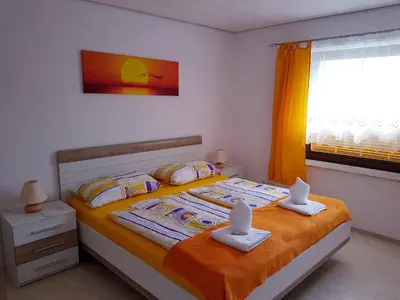 Ein Bett oder Betten in einem Zimmer der Unterkunft Kleine Nixe Krabbe