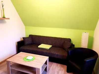 Ein Sitzbereich in der Unterkunft Kleine Nixe Dünenblick
