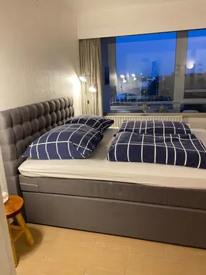 Ein Bett oder Betten in einem Zimmer der Unterkunft Seehütte Ferienwohnung 701