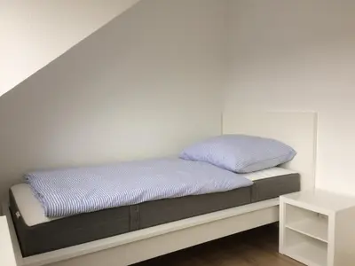 Ein Bett oder Betten in einem Zimmer der Unterkunft Nordseedüne, Ferienwohnung 11