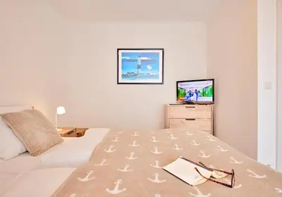 Ein Bett oder Betten in einem Zimmer der Unterkunft Kampweg 28