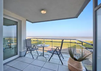 Ein Balkon oder eine Terrasse in der Unterkunft Düne 1, Ferienwohnung 11