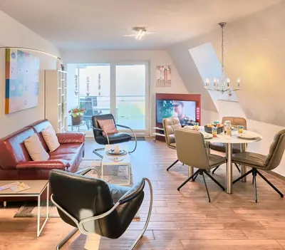 Ein Sitzbereich in der Unterkunft Düne 1, Ferienwohnung 12