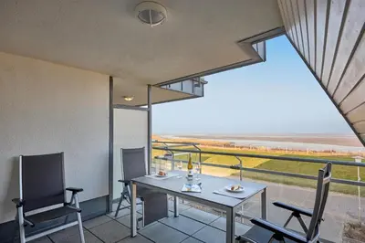 Ein Balkon oder eine Terrasse in der Unterkunft Düne 1, Ferienwohnung 12