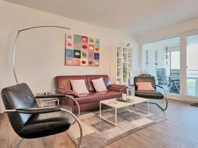 Ein Sitzbereich in der Unterkunft Düne 1, Ferienwohnung 12