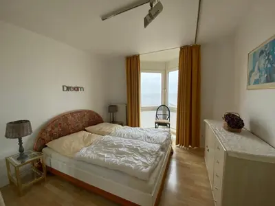 Ein Bett oder Betten in einem Zimmer der Unterkunft Meeresbrandung, Ferienwohnung 26