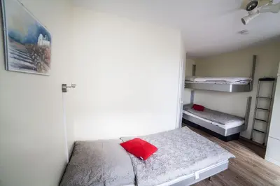Ein Bett oder Betten in einem Zimmer der Unterkunft Dünenglück, Ferienwohnung 24