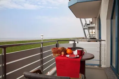 Ein Balkon oder eine Terrasse in der Unterkunft Dünenglück, Ferienwohnung 24